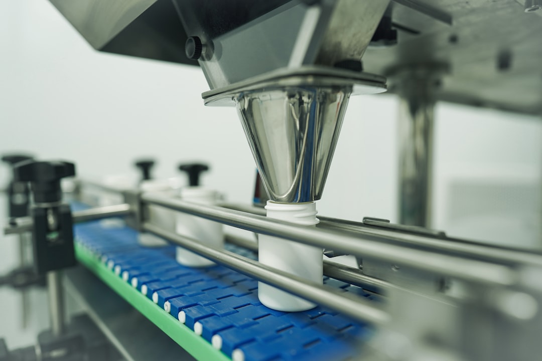 Bottles on automated line showing batch economics in private label herbal product pricing canada