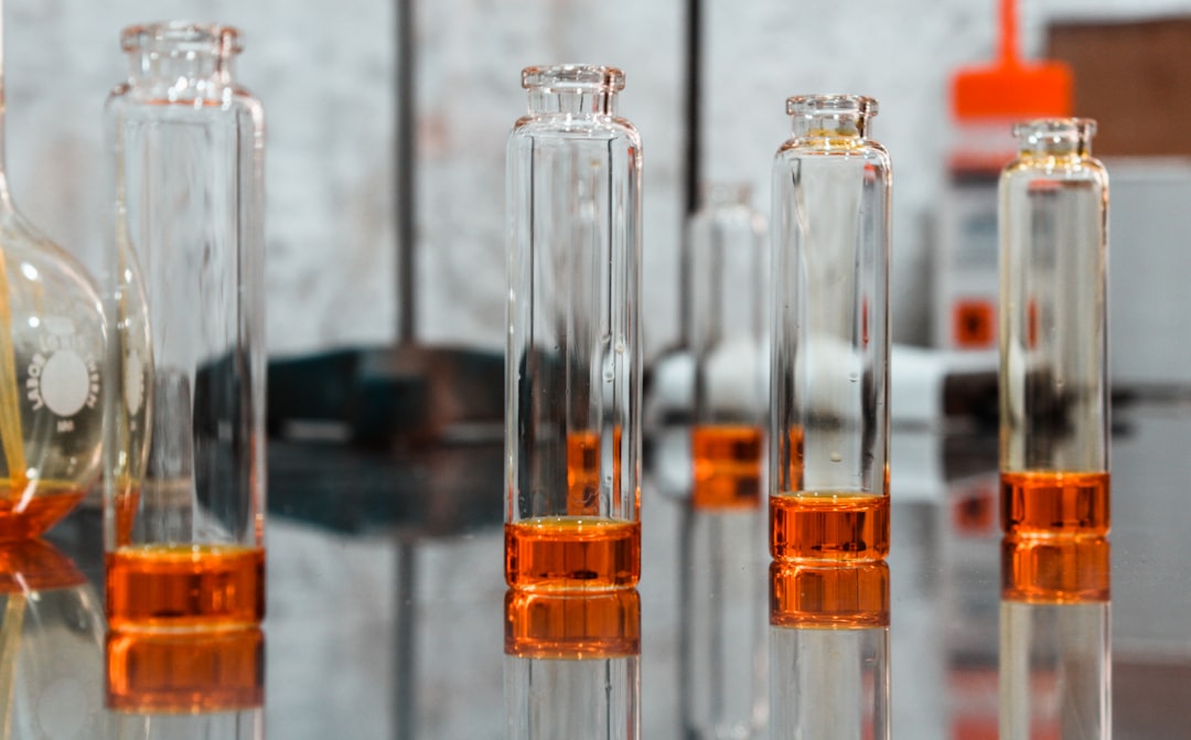 Botanical extract bottles beside capsule raw material in Canada