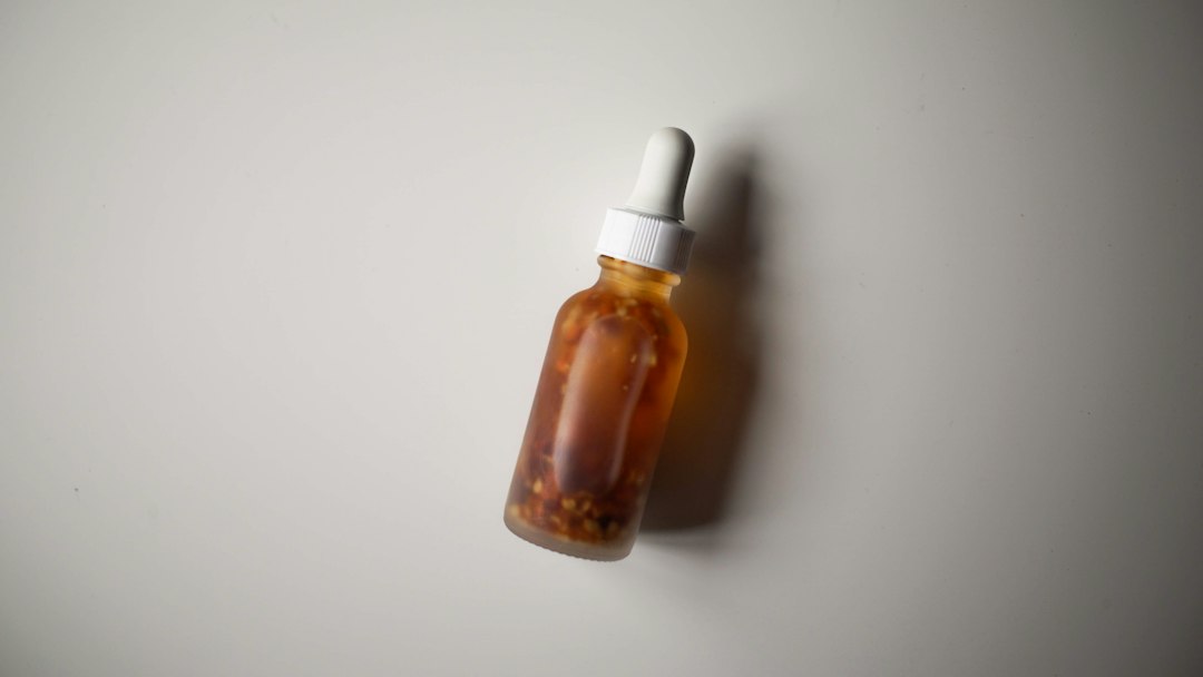 Unbranded amber dropper bottle representing a marketplace-ready herbal supplement unit
