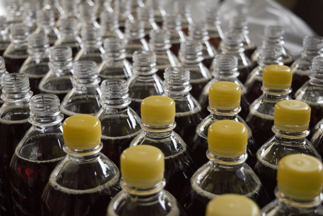 Bottles on a production line during the formulation phase