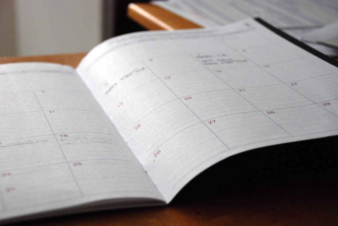 A planner open on a desk, used for mapping a herbal product launch timeline
