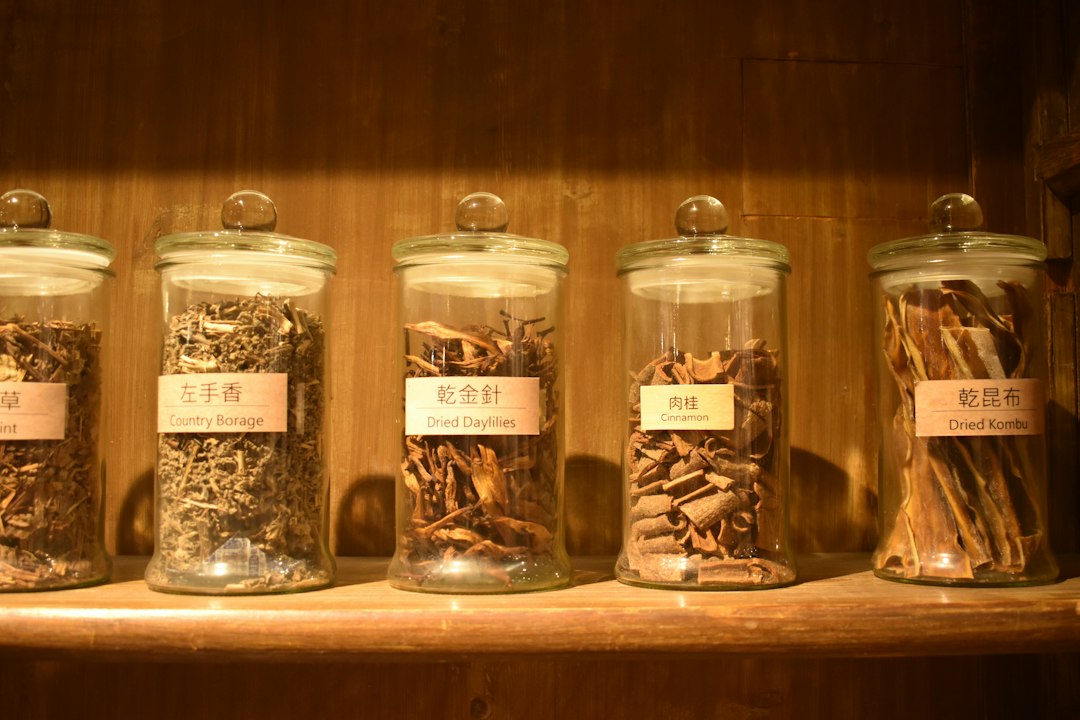 Labelled jars of dried botanicals, a reminder that NHP advertising rules in Canada start with accurate claims